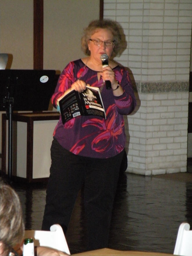 Rosemary Shomaker took her turn reading from the anthology.